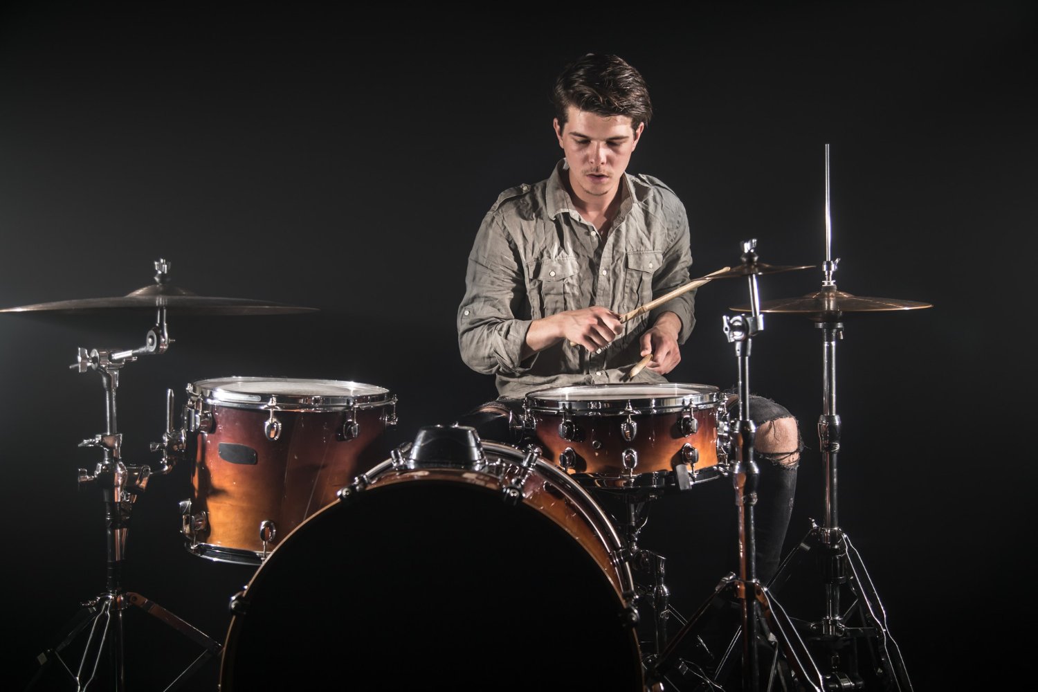 Whether you're starting out as a novice drummer or seeking to brush up on your skills, we help you to get familiarized with a drum kit. You will learn all about drum anatomy, stick techniques, timing, and drum rudiments. Keep in mind that maintaining a steady effort and displaying patience are important. Begin at a comfortable pace, prioritize precision, and incrementally enhance your abilities. Enjoy your drumming journey!
